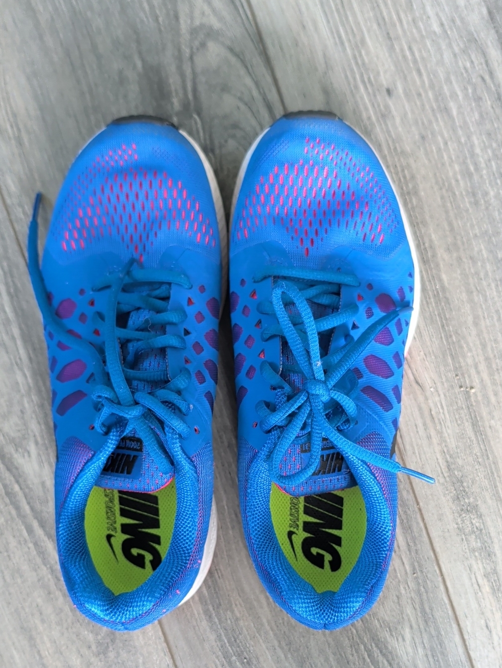 Nike Women's Blue Sneakers with Pink Accents